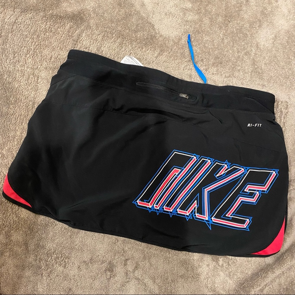 Black Nike Running Skirt with “Nike” on the back
